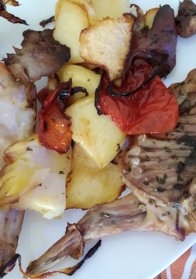 Una foto de Conejo al Horno