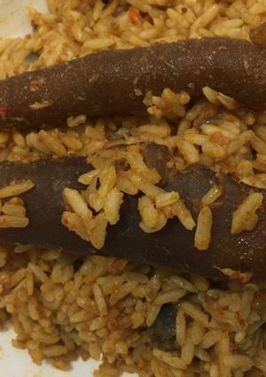 A picture of Jollof rice with pomo.