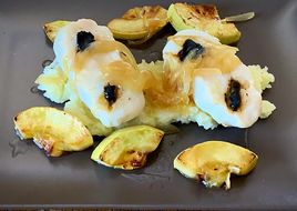 Merluza al horno con ajo negro