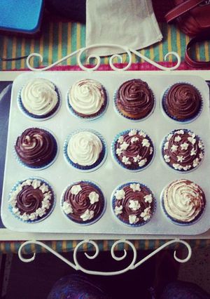 A picture of Vanilla Cupcakes, Whipped Cream Icing, Strawberry Filling.