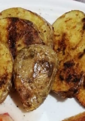 Una foto de Papas rústicas crocante !