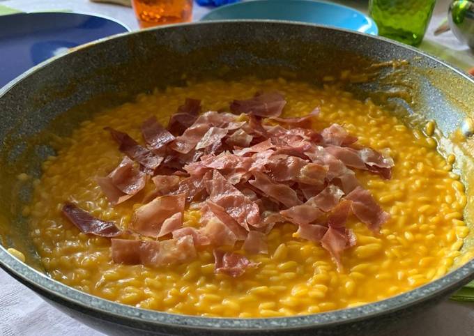 Ricetta di Perfetto Risotto con zucca porro e speck croccante