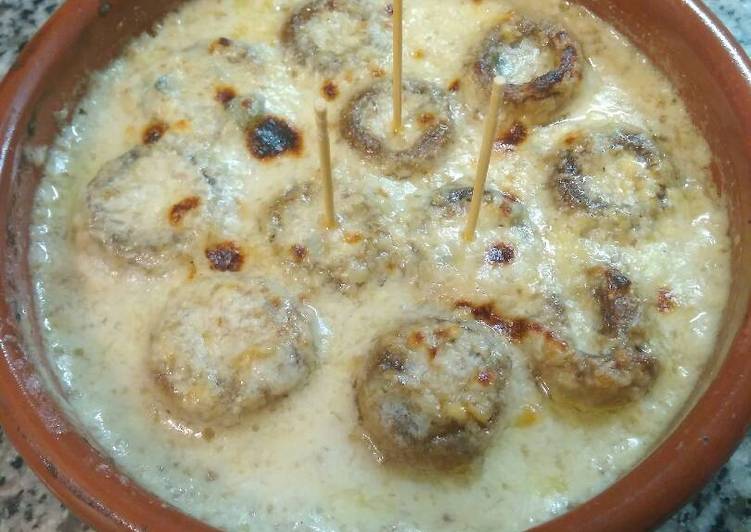 Tapa de champi a los 4 quesos