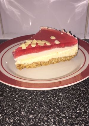 A picture of White Chocolate and Strawberry Jelly Cheesecake.