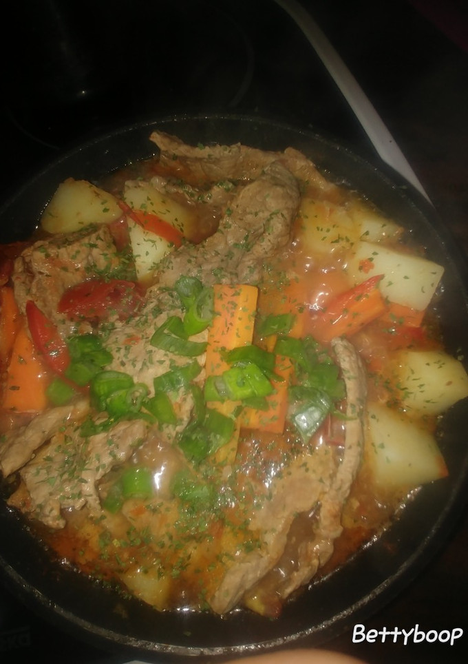 Una foto de Bife a la criolla