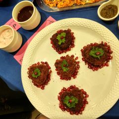 A picture of Beetroot Cutlet With Pomegranate sauce.