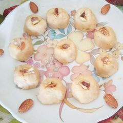 A picture of Delicious Tasty Unique Milk Powder Desiccated Coconut Dry Fruit Ball for Eid Festival.