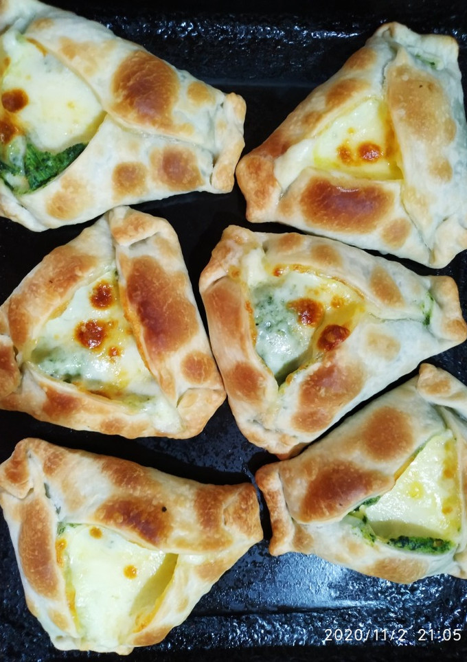 Una foto de Empanadas de espinaca y crema de batata