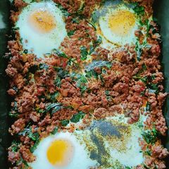 A picture of Baked Mince and Spinach Eggs.