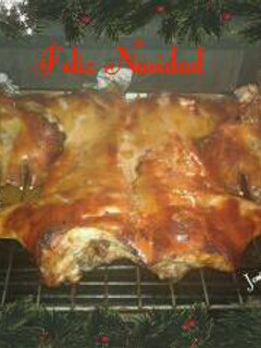 Una foto de Cochinillo al horno Platos Navideños