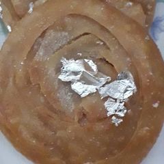 A picture of Satpura (Deep fried dessert).