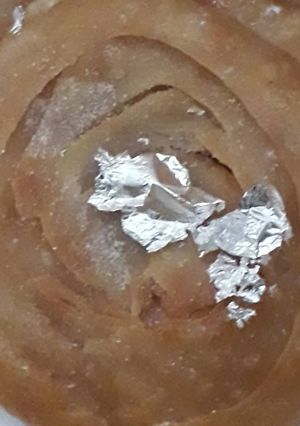A picture of Satpura (Deep fried dessert).