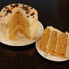 A picture of Orange Layer Cake with Orange / Vanilla Whipped Cream Filling and Frosting.