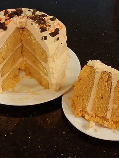 A picture of Orange Layer Cake with Orange / Vanilla Whipped Cream Filling and Frosting.