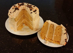 A picture of Orange Layer Cake with Orange / Vanilla Whipped Cream Filling and Frosting.