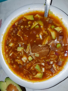 Una foto de Pozole de puerco Rojo