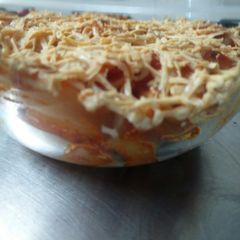 A picture of Tangy and spicy pasta baked dish (Jain/regular).