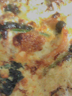 Una foto de Quiche de espinacas y setas