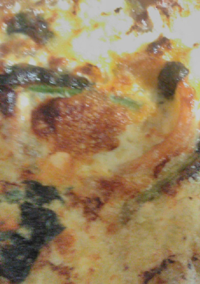 Una foto de Quiche de espinacas y setas