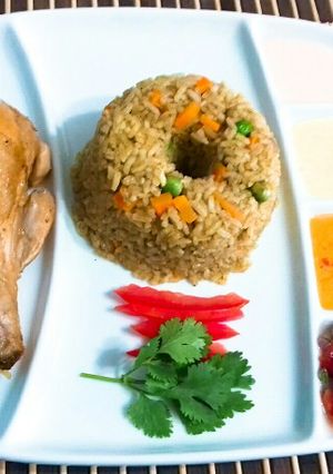 Una foto de Arroz con Pollo Peruano