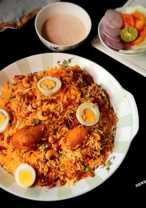 A picture of Kolkata Style Chicken Egg Dum Biryani.