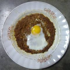 A picture of Soya keema with poached egg.
