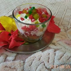 A picture of Masala apple with sweet curd.