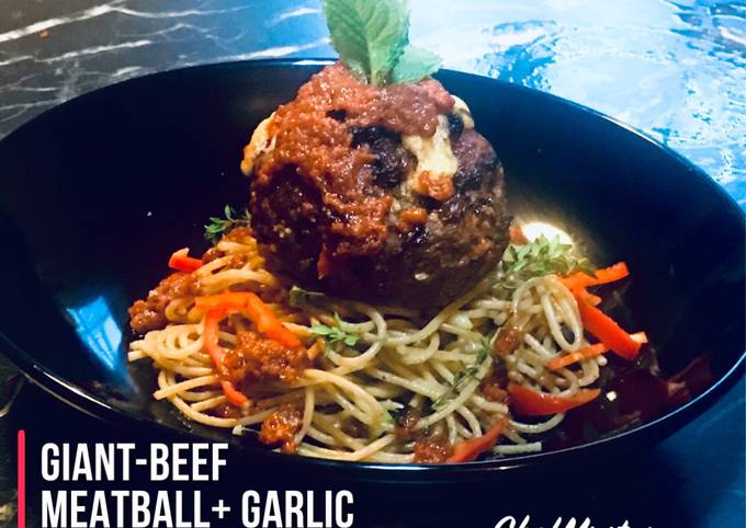 CHEESY-MEATY-HERBY  Giant Stuffed Beef Meatball with Garlic Butter Scallions and Mushrooms Spaghetti