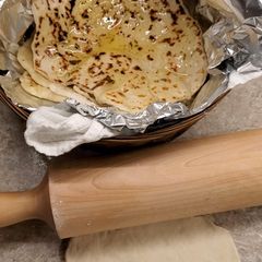 A picture of Garlic Butter Naan.