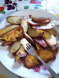 Una foto de Papas rústicas