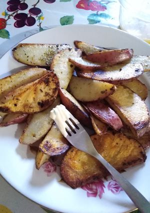 Una foto de Papas rústicas