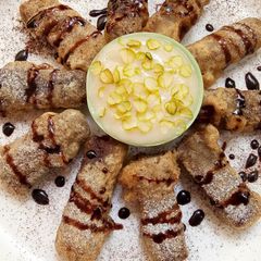 A picture of Fried chocolate bars with muskmelon phirni.