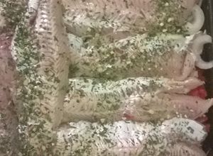 Una foto de Pescado al horno con Verduras
