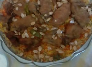 صورة لوصفة برياني على اصوله مية بالمية