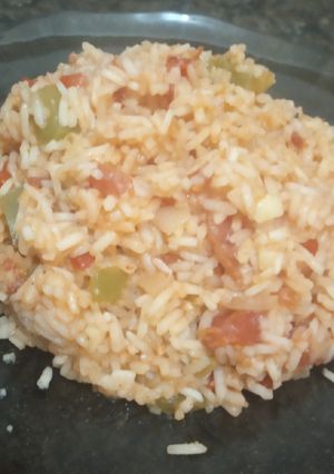 Una foto de Arroz con salsa