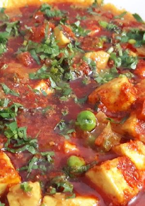 A picture of Achari Paneer Muter.