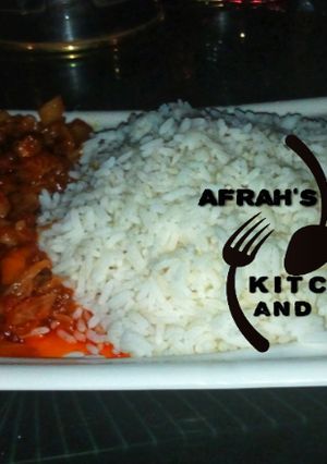 A picture of White rice with cabbage stew.