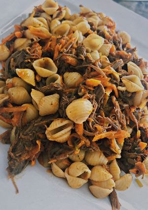 Una foto de Orecchiette with meat and carrot