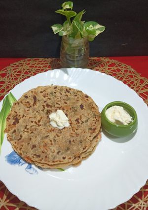 A picture of Winter Special Veggies Arrowroot Paratha With White Butter.