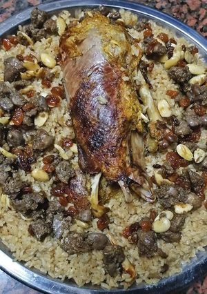 صورة لوصفة رز بالخلطه مع بط بالبرتقان