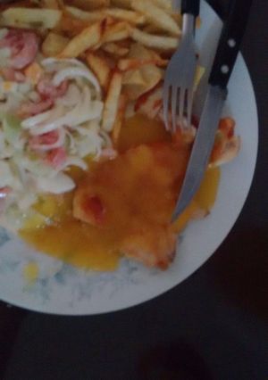 Una foto de Pechuga con Salsa de Maracuyá