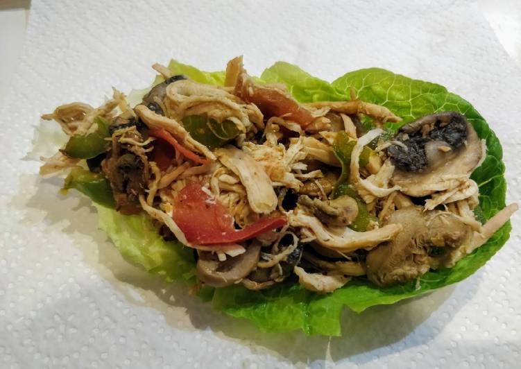 Taco o barquita de pollo desmechado sazonado