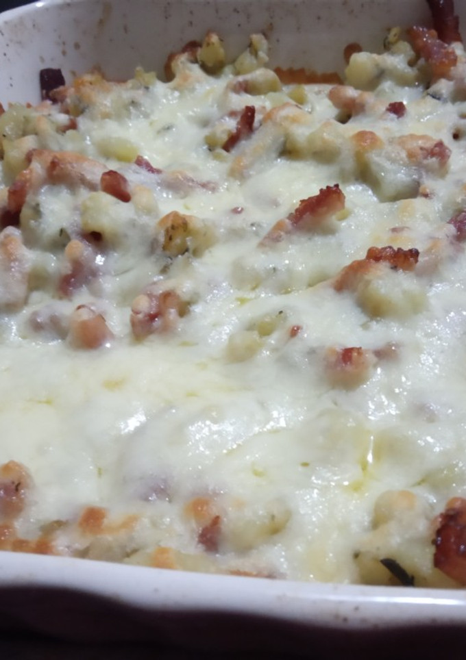 Una foto de Patatas al horno con bacon y queso