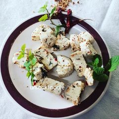 A picture of Homemade Paneer with Herbs.
