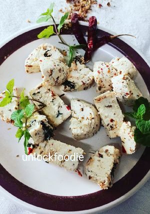 A picture of Homemade Paneer with Herbs.