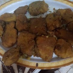 A picture of Fried potatoes and an egg.