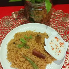 A picture of Sindhi Style Bhugga Chawal / Brown Rice.