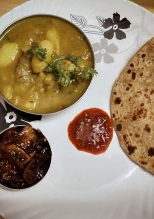 A picture of Sattu paratha with aloo bari ki sabji.