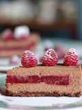 CHEESECAKE CON MOUSSE AL CIOCCOLATO FONDENTE ZENZERO E GELEE AI LAMPONI