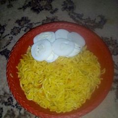 Indomie with boiled egg A picture of Indomie with boiled egg.